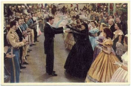 1940 A & M Wix Cinema Cavalcade Tobacco Card - No. 179: Gaiety in Atlanta - Scarlet (Vivien Leigh) scandalizes the aristocracy of Atlanta by agreeing to dance with Rhett Butler (Clark Gable) at the local ball although she is still in mourning for her husband.