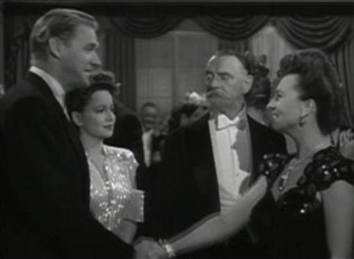 Tufts and de Havilland meet Agnes Moorehead and are snubbed by Sig Ruman