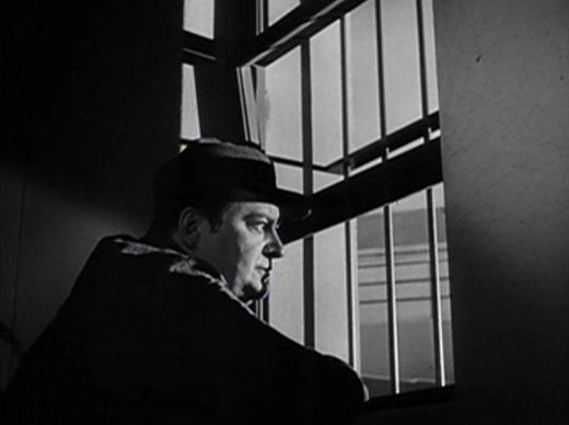 Edward Arnold behind bars